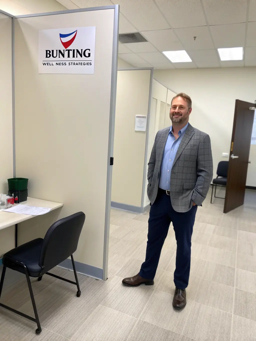 A candidate confidently providing a sample for a pre-employment drug screening test, highlighting Buntin Wellness Strategies' role in ensuring a safe and productive work environment.